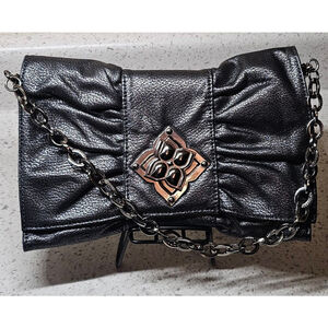 BCBGMAXAZRIA Black Metallic Leather Bow Clutch – Excellent Condition